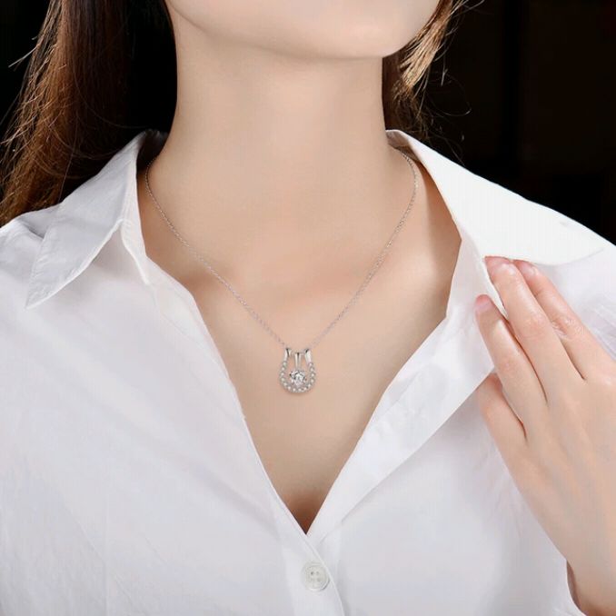 a girl with silver neckless