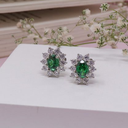 OVAL CIRCLE OF RADIANCE EMERALD EARRING